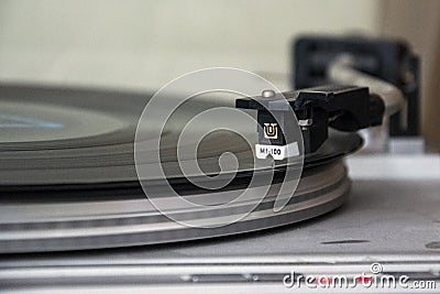 Vynil record playing with blurry background Stock Photo