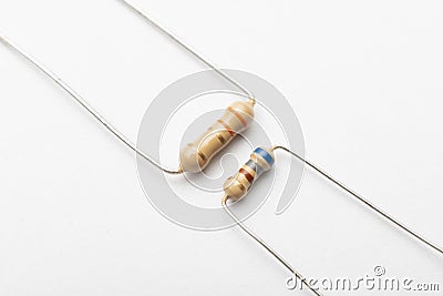 0.5w and 0.25w resistors in comparison on a white background Stock Photo