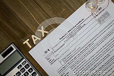 W4 Tax form for 2020 - Employee Withholding Certificate concept to declare multiple jobs or change withholding amount Editorial Stock Photo