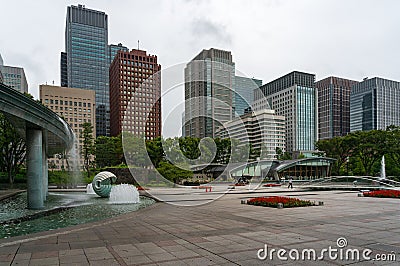 Wadakura Fountain park with Marunouchi cityscape on the background Editorial Stock Photo