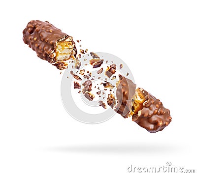 Waffle chocolate bar with nuts crushed in the air, isolated on a white background Stock Photo