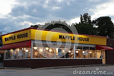 Waffle House restaurant early in the evening. Editorial Stock Photo