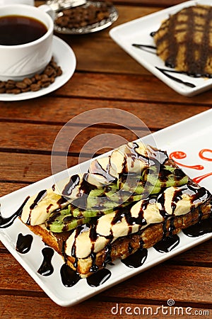 Waffle with ice cream and coffee Stock Photo