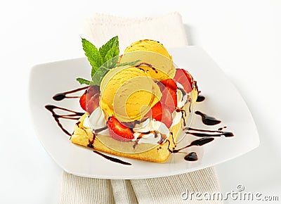 Waffle with ice cream and strawberries Stock Photo