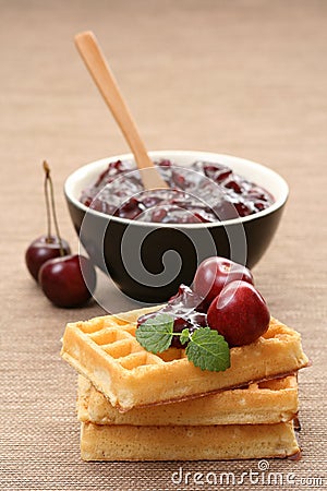 Waffles and fresh cherry jam Stock Photo
