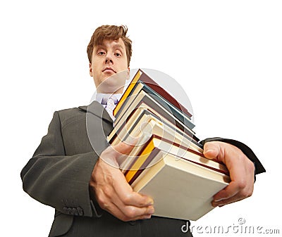 Waggish man holding pile of textbooks Stock Photo