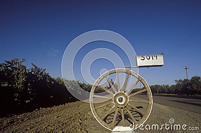 A wagon wheel mailbox, Modesto, CA Stock Photo