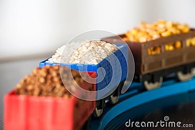 Wagons with grain of rice, peas and buckwheat. Grain Cultures. Stock Photo