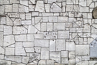 Wailing Wall at Remuh Cemetery built with fragments of Jewish tombstones, Krakow, Poland Stock Photo