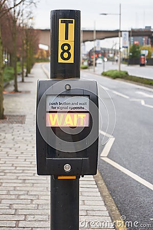 Wait signal at a typical pedestrian crossing in UK Editorial Stock Photo