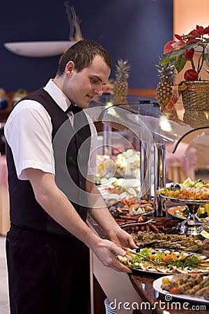 Waiter and buffet Stock Photo