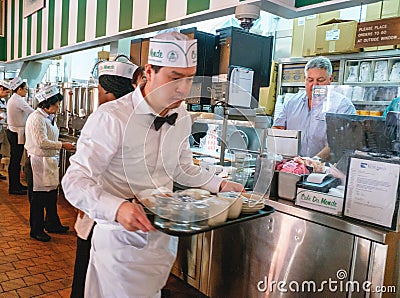 Waiter in Cafe Du Monde New Orleans Editorial Stock Photo