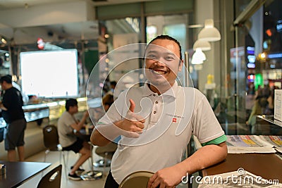 Waiter in cafe Editorial Stock Photo