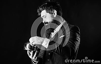 Waiter luxury restaurant. Man well groomed gentleman formal suit hold little cloche. Serving and presentation. Elite Stock Photo