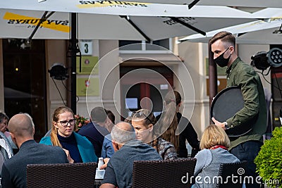 Waiter with a mask Editorial Stock Photo