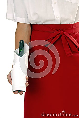 Waiter in red apron with wine Stock Photo