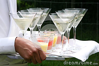 Waiter serving champagne Stock Photo