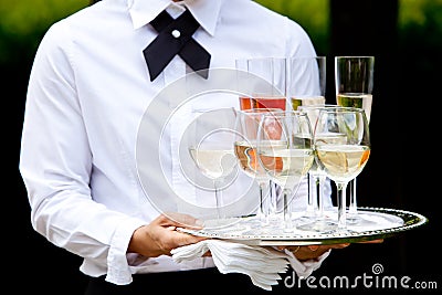 Waiter serving drinks - wedding series Stock Photo