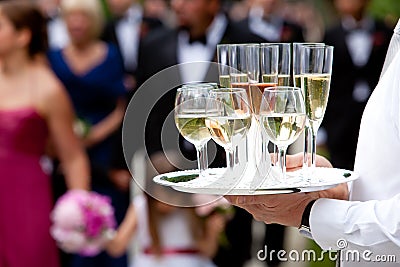 Waiter serving drinks - wedding series Stock Photo