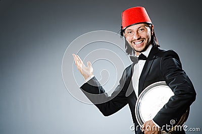 Waiter wearing traditional Stock Photo