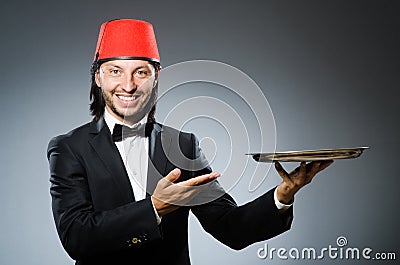 Waiter wearing traditional Stock Photo