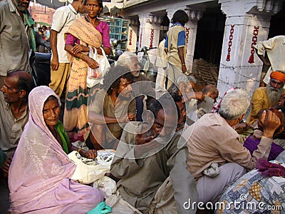 Waiting for alms Editorial Stock Photo