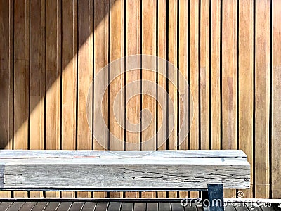 waiting area solid geometric texture wood bench with steel leg on stripe wood floor on vertical random size wood stripe background Stock Photo