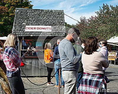 Waiting for Cider Donuts Editorial Stock Photo