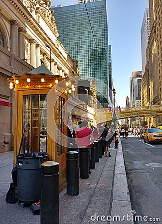 Waiting in Line for a Taxi on 42nd Street Near Grand Central Terminal, New York City, NYC, NY, USA Editorial Stock Photo
