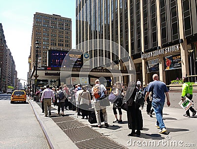 Waiting for a NYC Taxicab in Front of Madison Square Garden Editorial Stock Photo