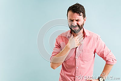 Waiting for the reflux medicine to work Stock Photo