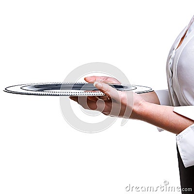 Waitress holding a silver tray isolated on white. Stock Photo