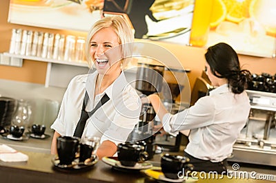 Waitress serving coffee cups making espresso woman Stock Photo