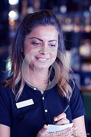 Waitress take a customer`s order Stock Photo