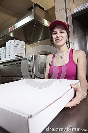 Waitress with take out pizza Stock Photo