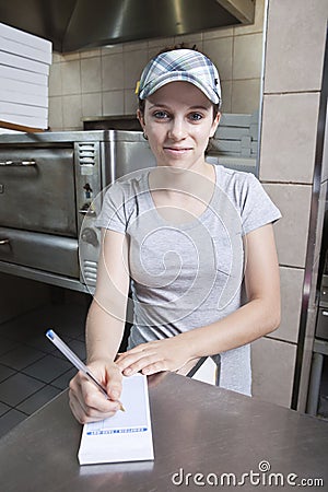 Waitress taking order in a fast food restaurant Stock Photo