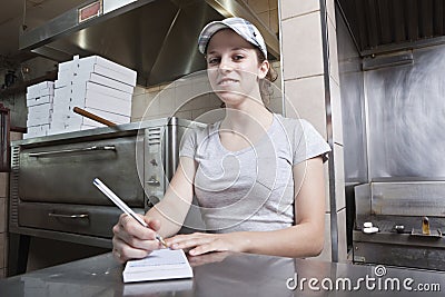 Waitress taking order in a fast food restaurant Stock Photo