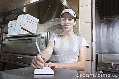 Waitress taking order in a fast food restaurant Stock Photo