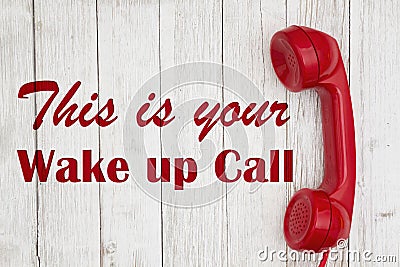Wake up call text with retro red phone handset Stock Photo
