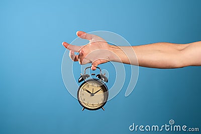 Wake up and get up, its time to act, concept. Clock and alarm clock, attention its time to do. Stock Photo