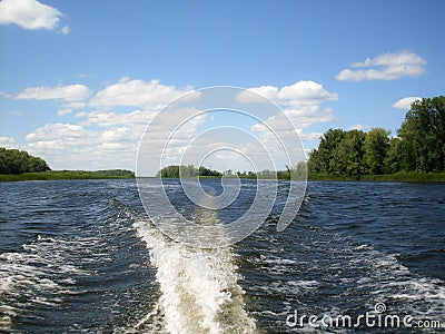 A Wake on the water from boats Stock Photo