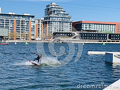 WakeUp Docklands is Londonâ€™s first and only Cable Wake Park and Stand Up Paddleboard venue Editorial Stock Photo