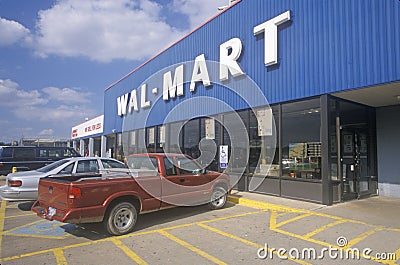 Wal * Mart Supercenter Store front entrance and parking lot in Southeast USA Editorial Stock Photo