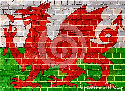 Wales flag on a brick wall background Stock Photo