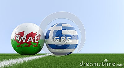 Wales vs. Greek Soccer Match - Leather balls in Wales and Greek national colors on a soccer field. Stock Photo