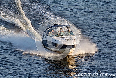 Walk on the fast white boat Editorial Stock Photo