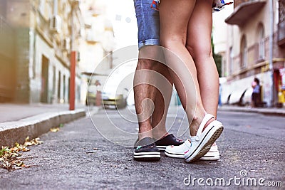 Walk a guy and a girl, focus on their new sandals Stock Photo