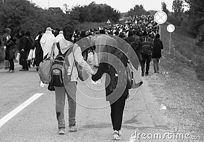 Walk in the hope of a right life-European refuges crisis Editorial Stock Photo