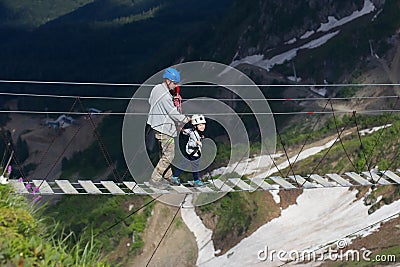 Walk on the rope bridge Stock Photo