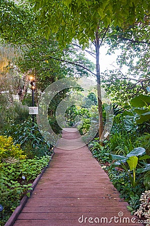 Walk trail leading to garden Stock Photo